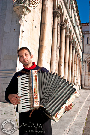 Miva Stock_1887 - Italy, Lucca, accordian player