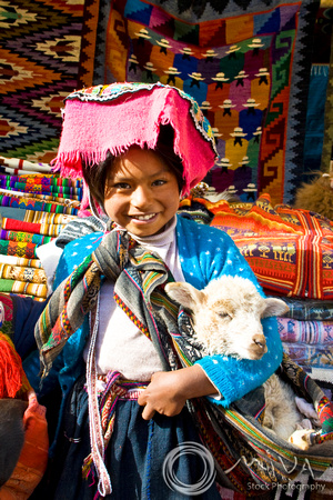 Miva Stock_0914 - Peru, Pisac, girl, lamb at market