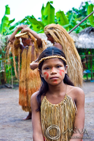 Miva Stock_1163 - Peru, Iquitos, tribesmen and girl