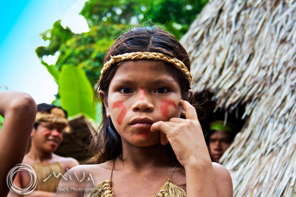 Miva Stock_1166 - Peru, Iquitos, tribesmen and girl