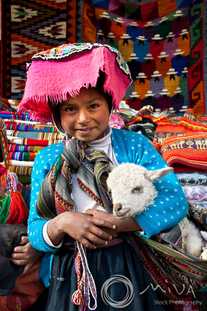 Miva Stock_1207 - Peru, Pisac, girl and lamb at market