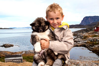 Miva Stock_3549 - Greenland, Nuuk, Sermersooq, boy, Husky puppy